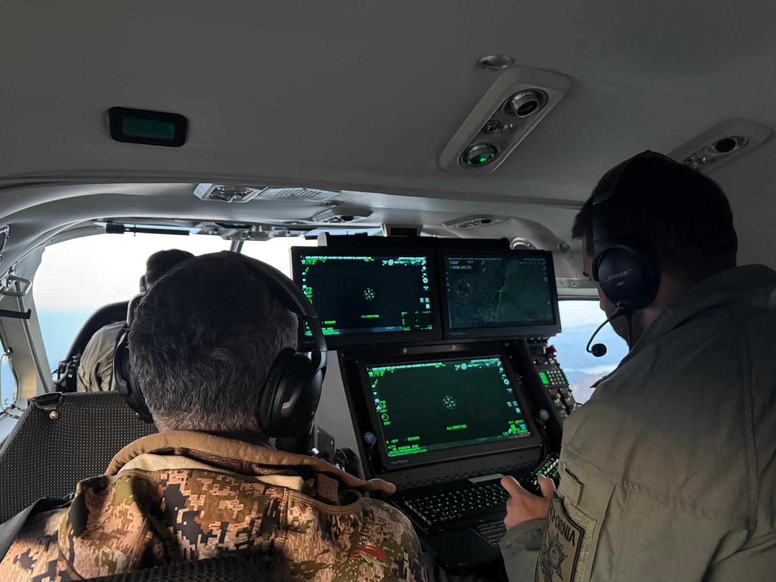 CDFW biologists and law enforcement officers surveying wolf movements from the sky 
